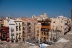 View a neighboring courtyard and Tarragona from the top of Great Uncle Rob's caste walls