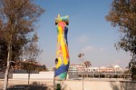 Statue by Joan Mirò that sits in a public playground