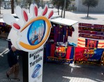 The Bus Turistic logo with 3 symbols of Barcelona: Torre Agbar, Columbus, and the Sagrada Família, ...