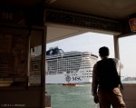 Back of the MSC Divinia as it passes by the same (boat)bus stop