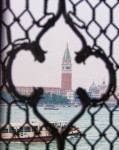 The St. Mark's Bell Tower through a window in the museum behind the cafe