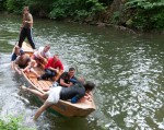 Stocherkahnrennen 2012 - photo #25 - another guy getting back into his boat after it ran off course