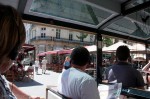Outdoor cafes seen from the train