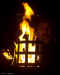 Friendly Tourist warming himself by a fire, Esslingen Christmas Market, 2011