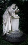 Statue and headstone