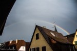 The full arc of the rainbow visible from our window