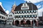 Weil der Stadt City Hall with the tower of the Church of St. Peter and St. Paul behind