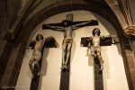 Statues on the crosses, each with hair